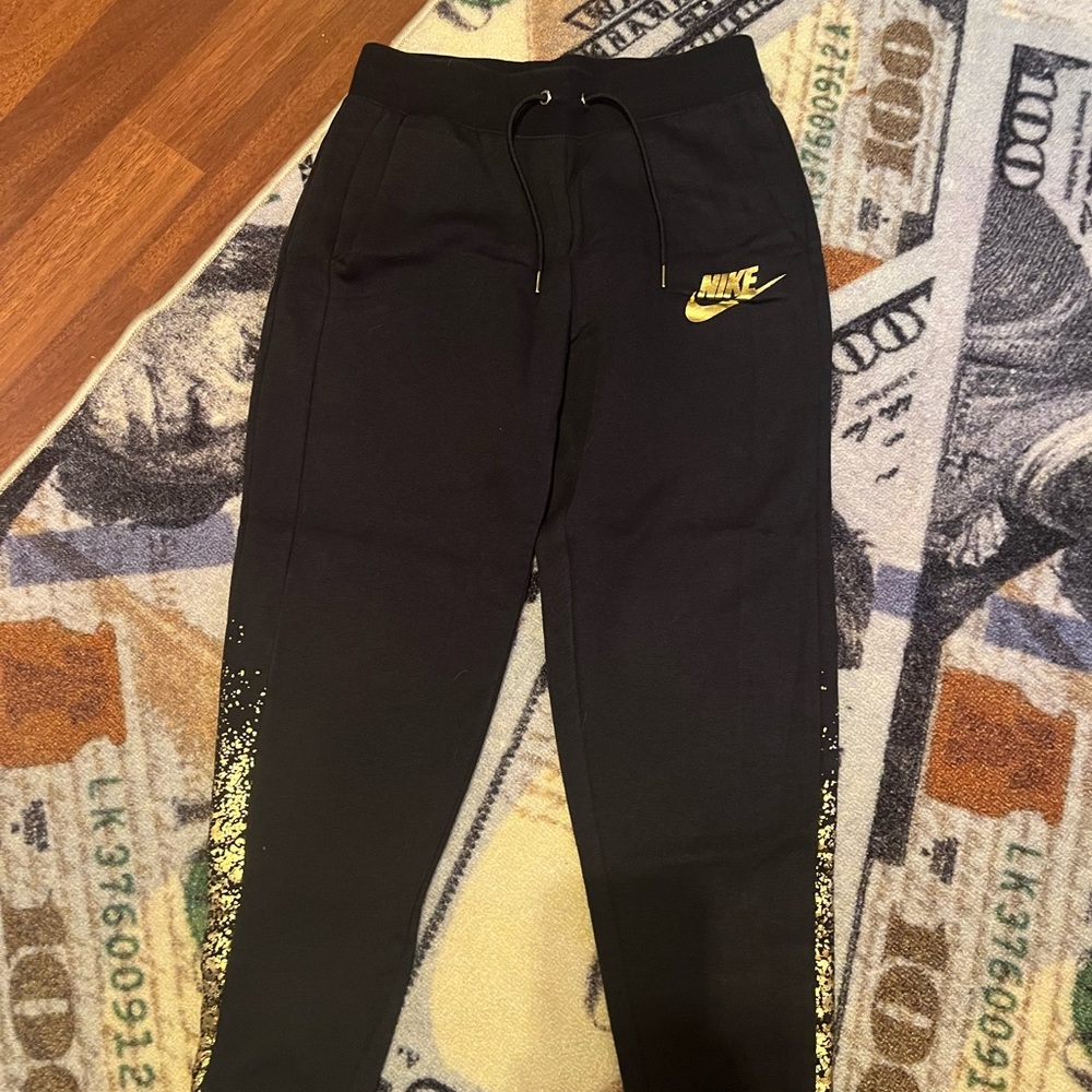 Nike Kids Black Sweatpants with Yellow Logo